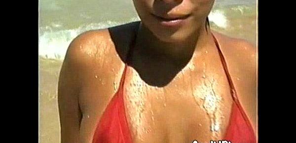 Latina in Bikini Flashes Tits at Beach